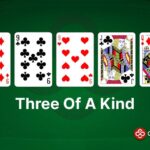 An example of Three of a Kind in poker (Trips or Set), made with 9h 9c 9h Jc Qd.