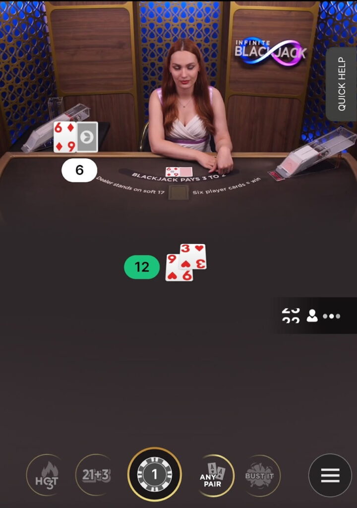 A live game of Infinite Blackjack on the CoinPoker Casino app.