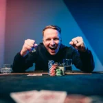 An image showing CoinPoker ambassador Benjamin Rolle, aka Bencb, at a poker table.
